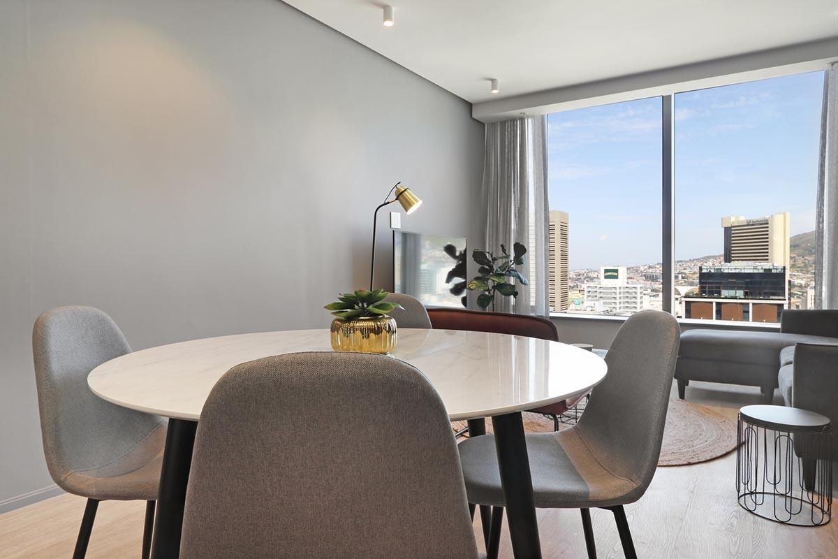 Experience City Living with a Serene Mountain Backdrop - Photo 4