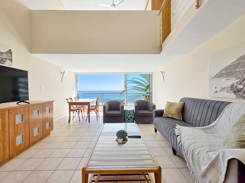 Sensational views from this one bedroom duplex apartment - Photo 3