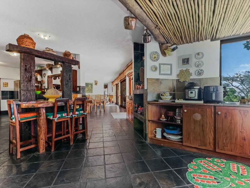 AN EXQUISITE, BUSH LODGE-THEMED, FAMILY SANCTUARY OFFERING TIMELESS ELEGANCE AND UNMATCHED TRANQUILITY IN A SERENE INDIGENOUS GARDEN SETTING - Photo 10