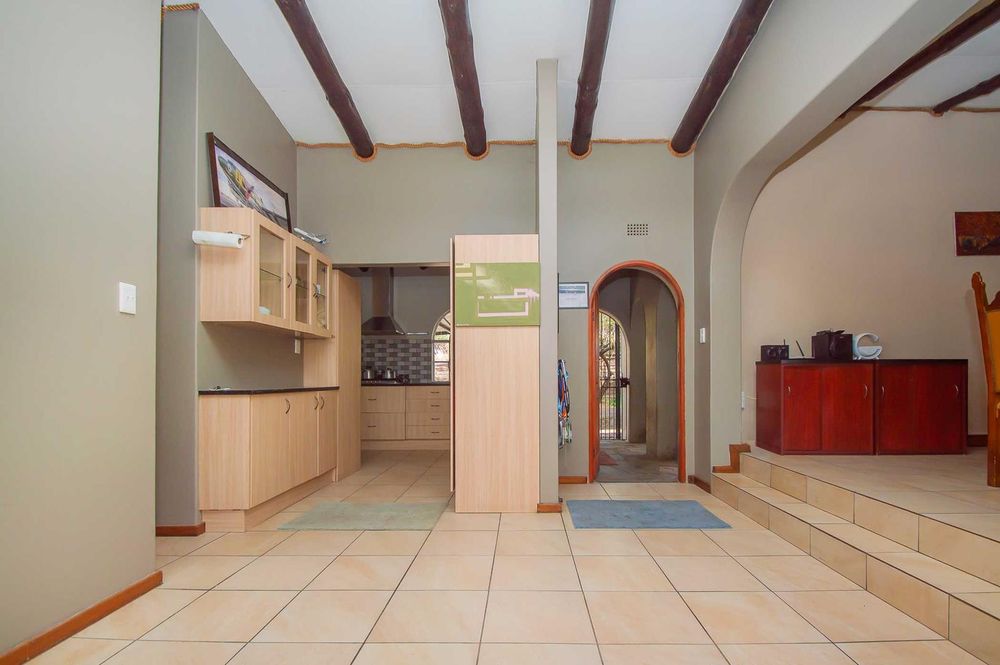 Open entrance to reception and kitchen