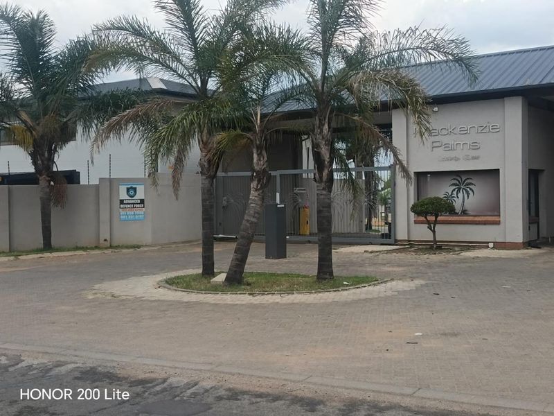 1. "Discover Your Dream Home in Mackenzie Palms!" 2. "Luxurious Living Awaits in This 3-Bedroom Gem!" 3. "Modern Comfort Meets Security in Mackenzie Palms!" 4. - Photo 2