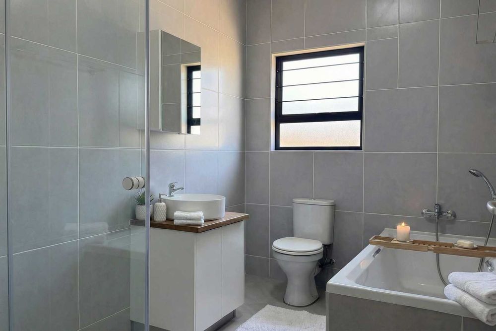 Family bathroom with both bath & shower.