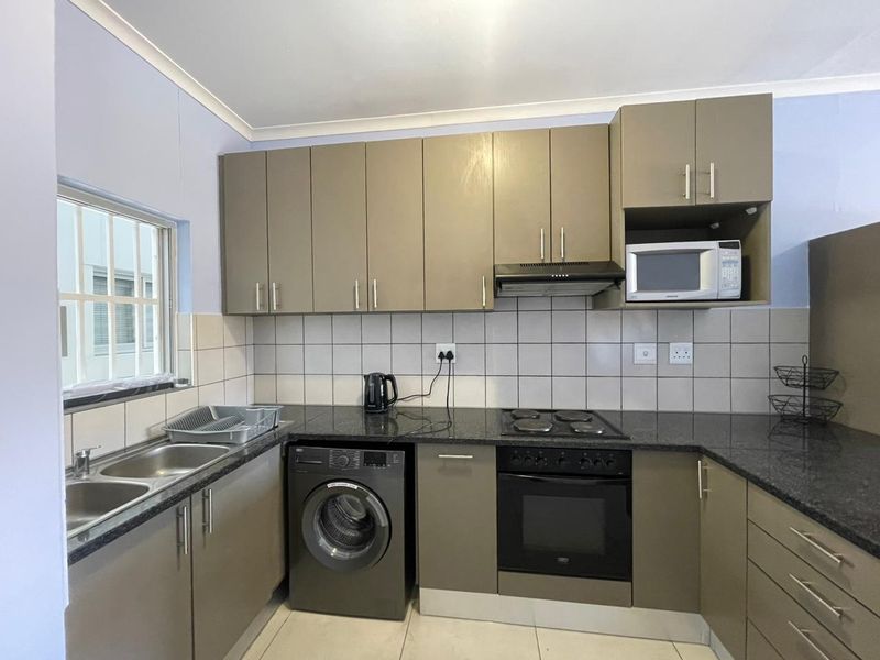 MODERN 2 BEDROOM FULLY FURNISHED APARTMENT FOR SALE IN KLEIN WINDHOEK: CITY PLAZA - Photo 8