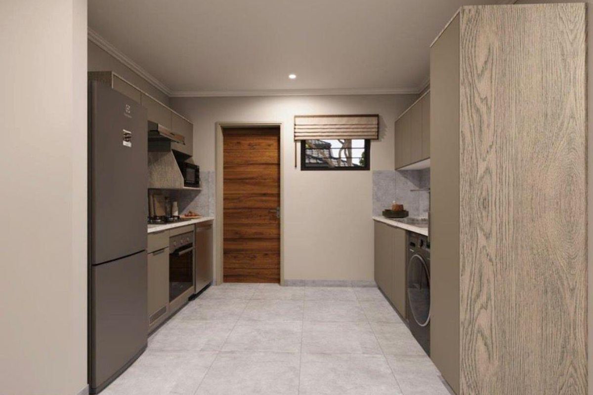 Modern galley-style kitchen featuring sleek cabinetry, integrated appliances, stone-look countertops, and tiled flooring in a contemporary townhouse setting.