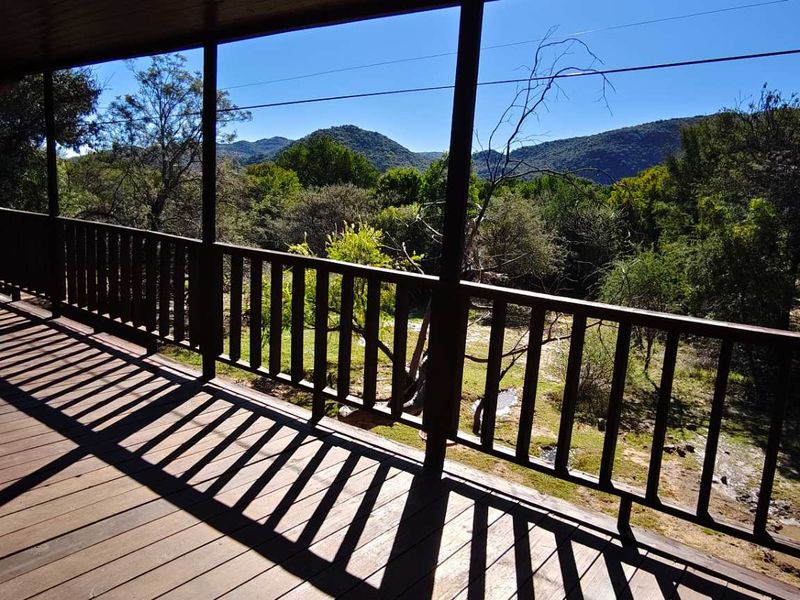 Charming Log Home Retreat with Spectacular Mountain Views - Photo 4