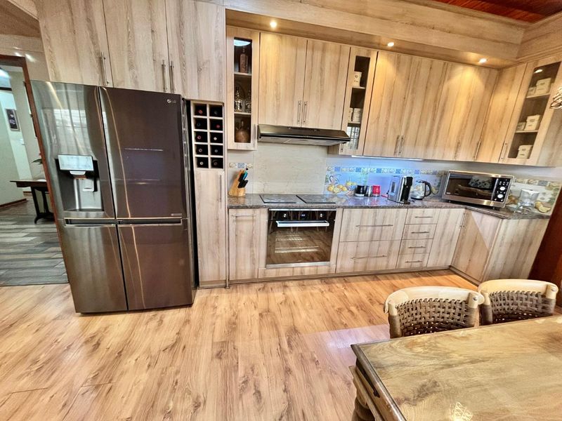 Four bedroom house in the secure boomed off area of Parkrand - Photo 8