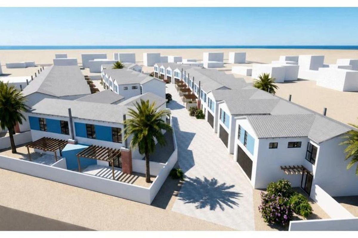 An aerial perspective of a modern townhouse development featuring uniform pitched roofs, paved driveways, and private outdoor areas with timber pergolas.