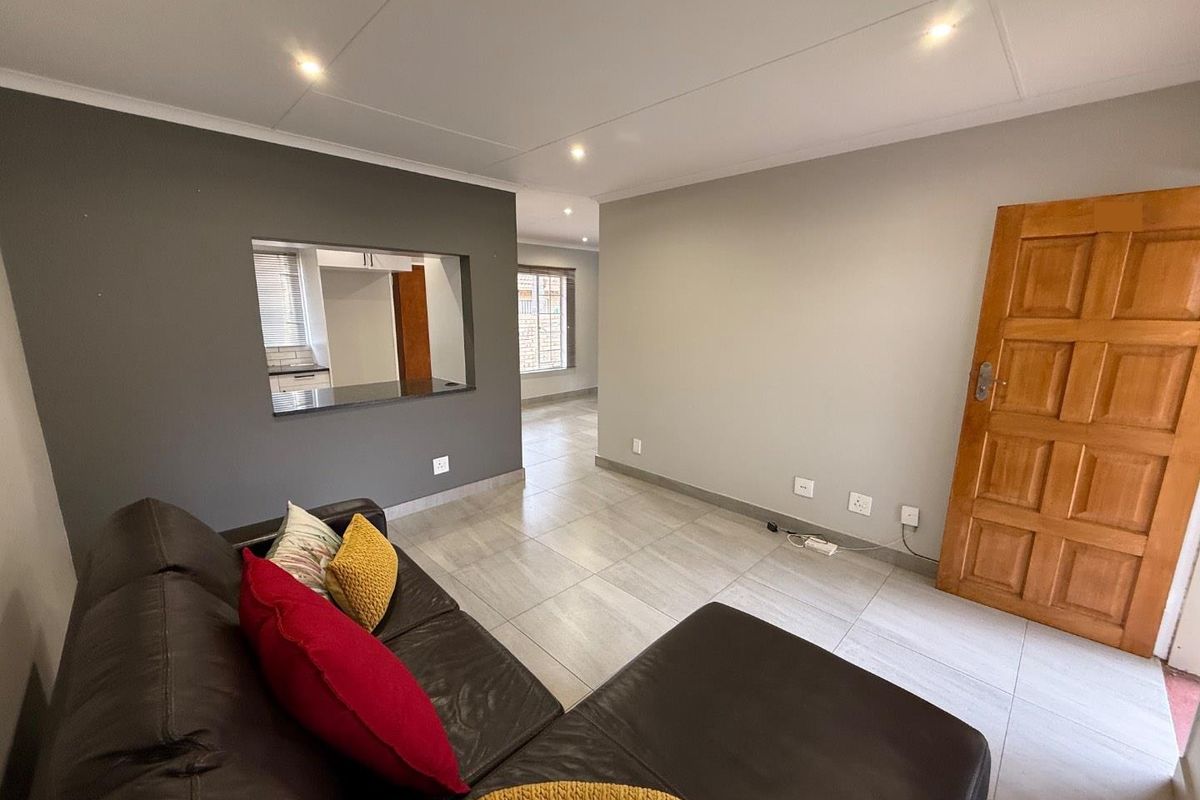 Stylishly Renovated Two-Bedroom Simplex with Double Garage and Garden - Photo 5