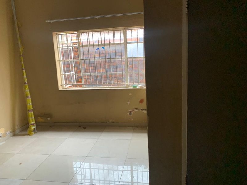 Charming 4-Bedroom Home with Additional Cottages in Rosettenville Rental Income R24k - Photo 7