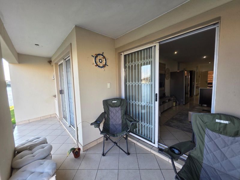 Rare Find – Ground Floor Apartment with Direct Lake Access Waterclub, Leisure Bay Estate - Photo 5