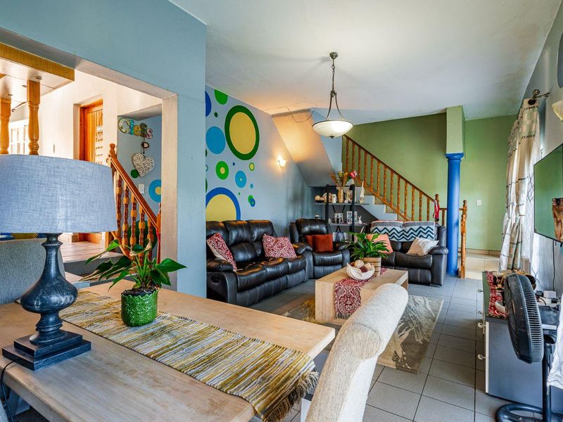 Spacious Hillside Townhouse with Scenic Views & Great Potential - Photo 9