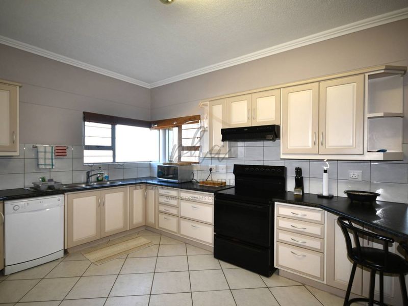 Exceptional Double-Story Beachfront Home with Unobstructed Sea Views - Photo 8