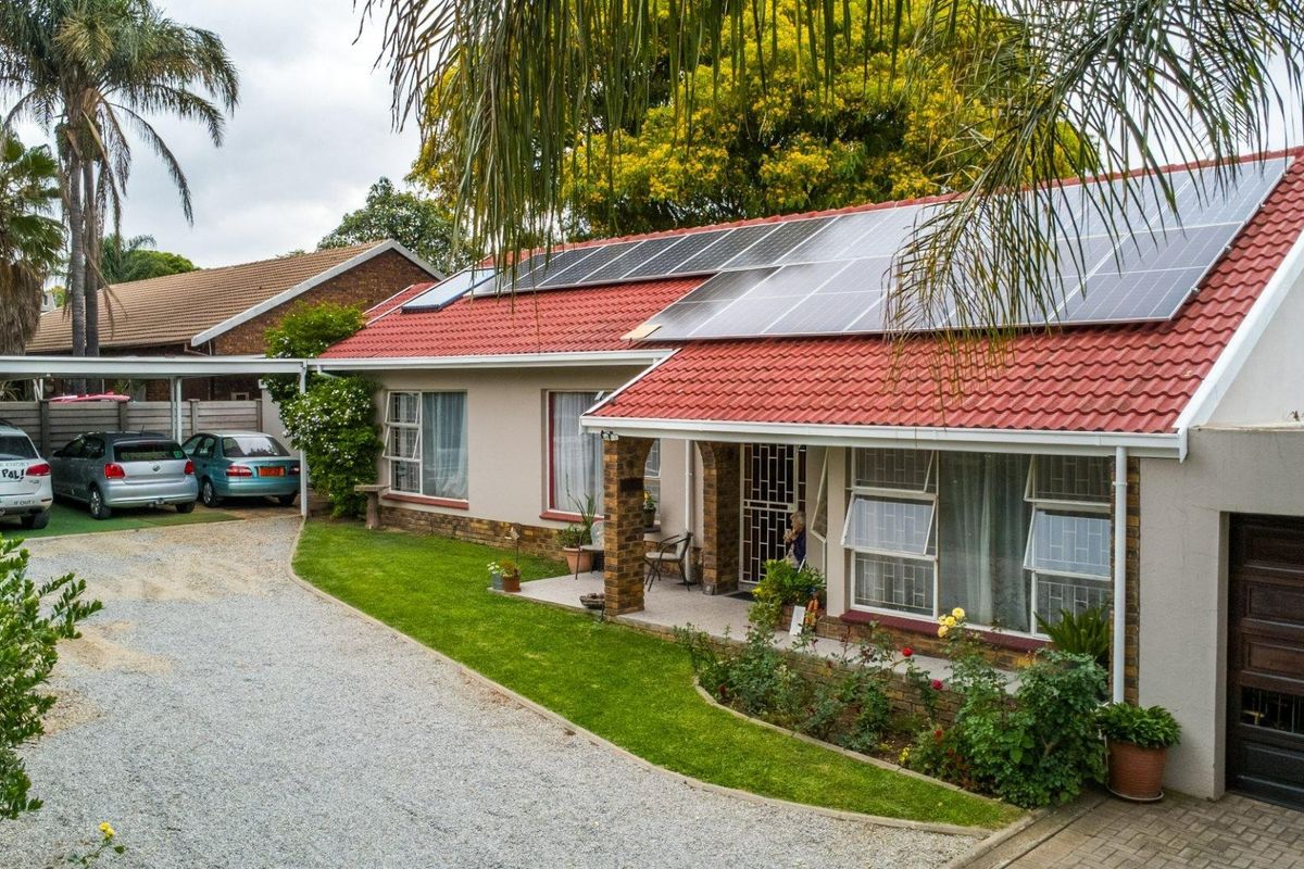 Family Home with Flatlet, Solar Power, and Pool in Sought-After Rooihuiskraal - Photo 3