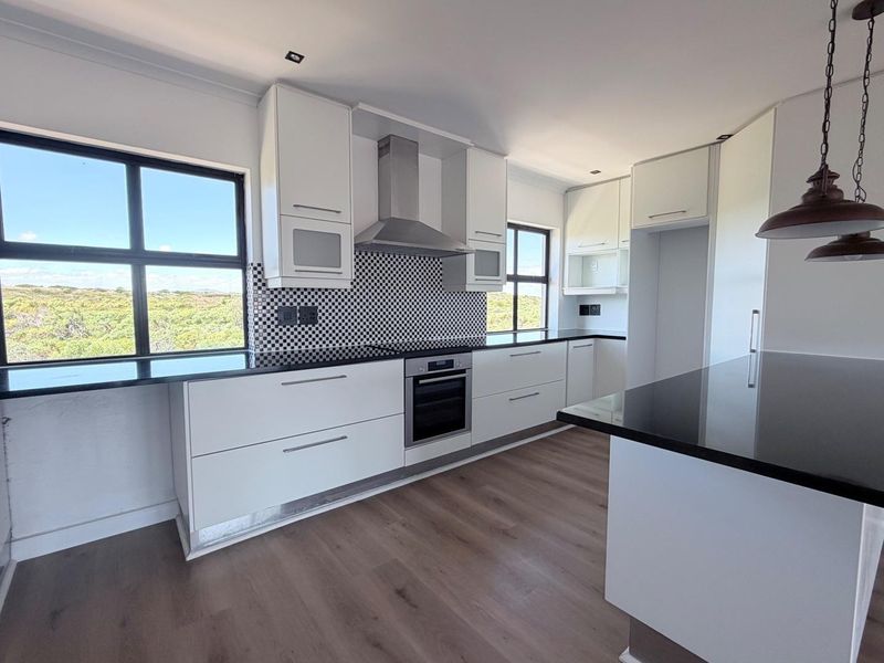 Modern Three-Bedroom Triplex in Island View, La Paloma – With Table Mountain Views - Photo 8