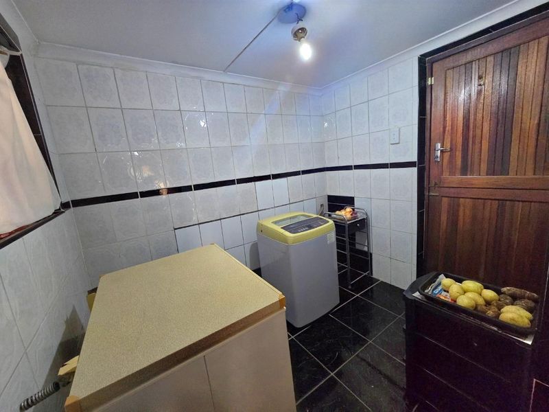 Spacious Four-Bedroom Family Home with potential Flatlet and Scenic Views - Photo 6