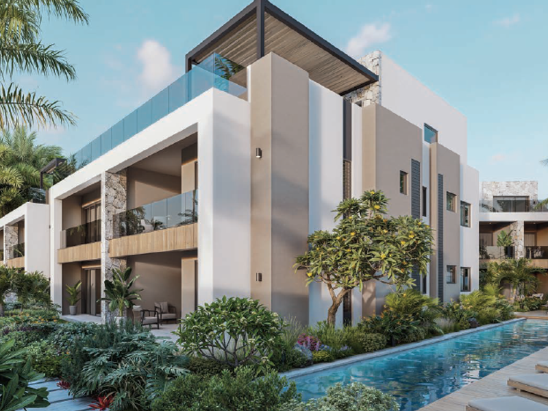Modern penthouse exterior featuring a swimming pool, landscaped gardens, stone-clad facade, and spacious covered balconies with glass balustrades.