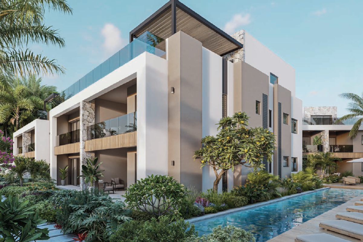 Modern penthouse exterior featuring a swimming pool, landscaped gardens, stone-clad facade, and spacious covered balconies with glass balustrades.