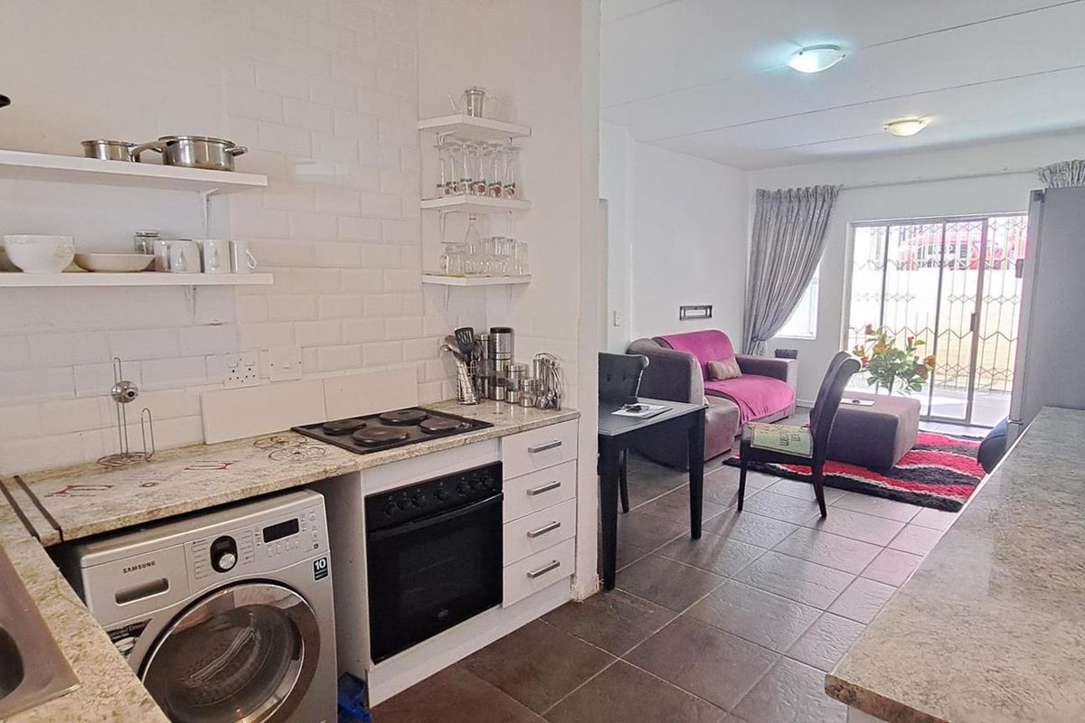 Modern 2-Bedroom, 2-Bathroom Apartment with Patio & Braai – Walk to Northgate Shopping Centre - Photo 5