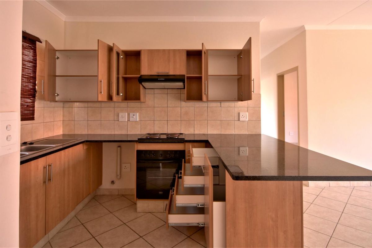 Prime Location! Modern Apartment with 24/7 Security! - Photo 3
