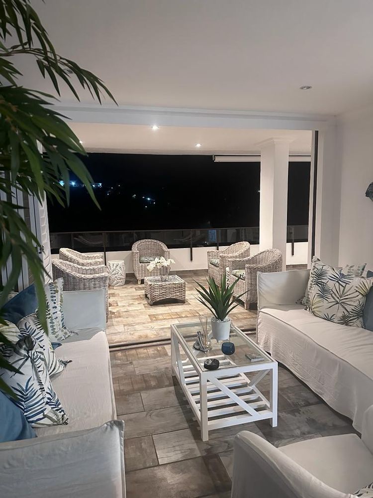 Lounge Area leading out to covered Patio - perfectly lit and spacious!