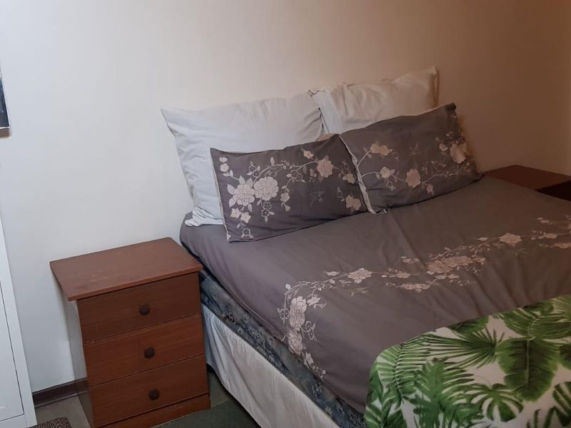 Cozy 2nd-Floor Unit Near Gautrain with Secure Parking - Photo 2