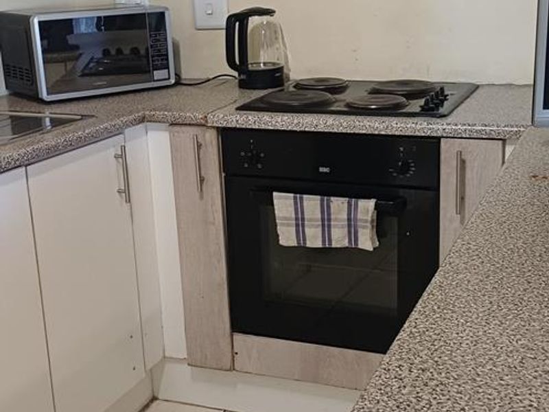 This affordable apartment in Extension 6 is ideal for single professionals, young couples, and first-time buyers wanting a safe and cozy place to call home! 🏡 - Photo 7