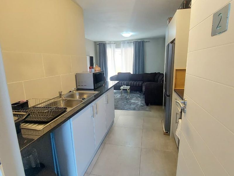 Cozy 2-Bed Ground-Floor Unit with Private Patio & Storage - Photo 1
