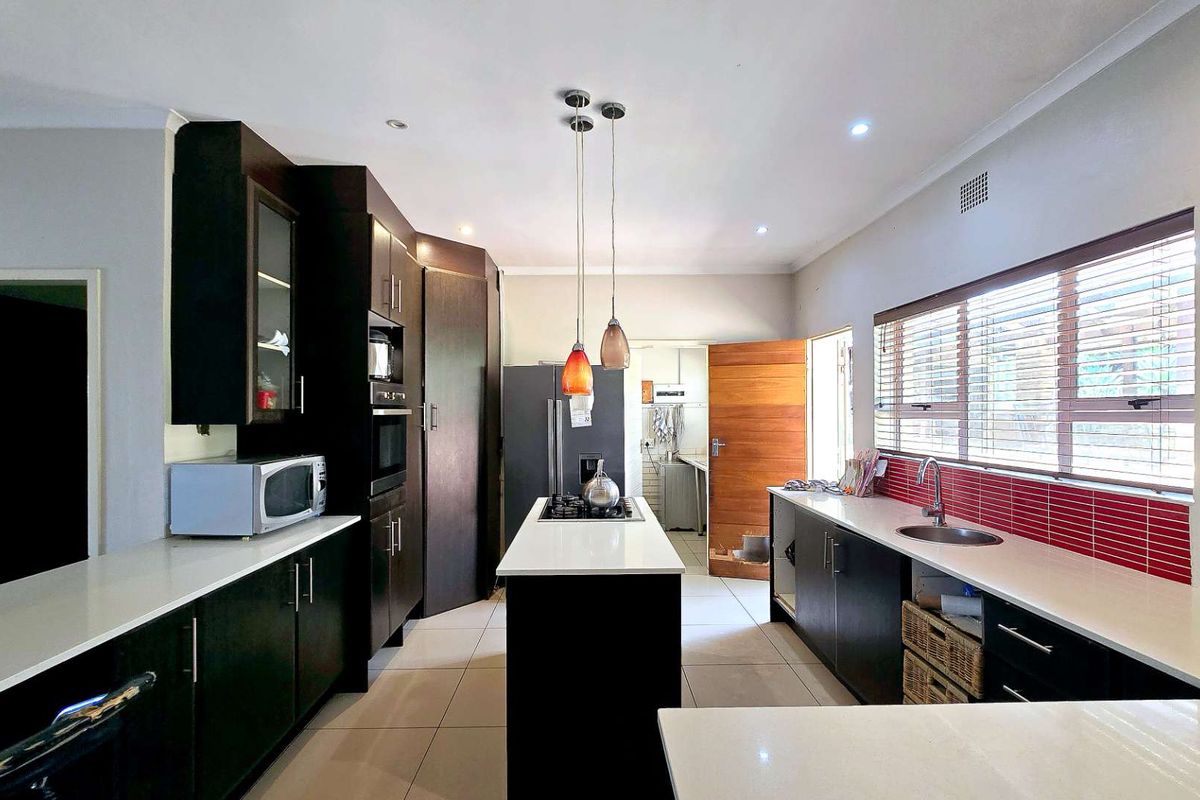 Spacious Family Living Meets Modern Off-Grid Convenience in Meyerspark - Photo 2