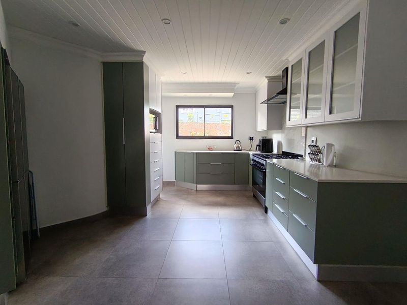 Stylish Family Home with Built-In Braai & More! - Photo 8