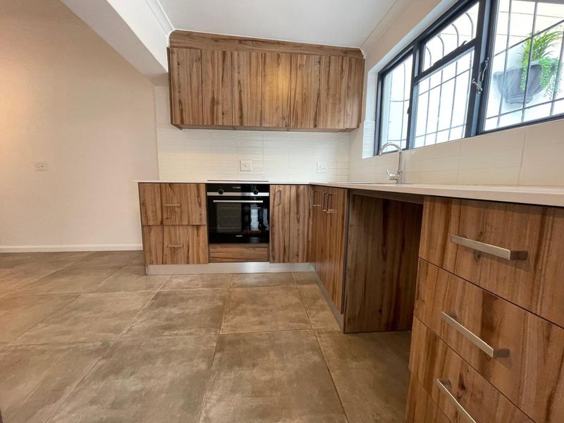 Renovated Two Bedroom Home with Excellent Security - Photo 10