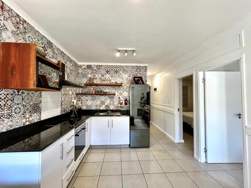 Furnished 2-Bedroom Apartment in Family-Friendly Estate - Photo 2