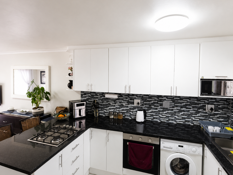 Newly Renovated Ground Floor Gem with Garage - Photo 5
