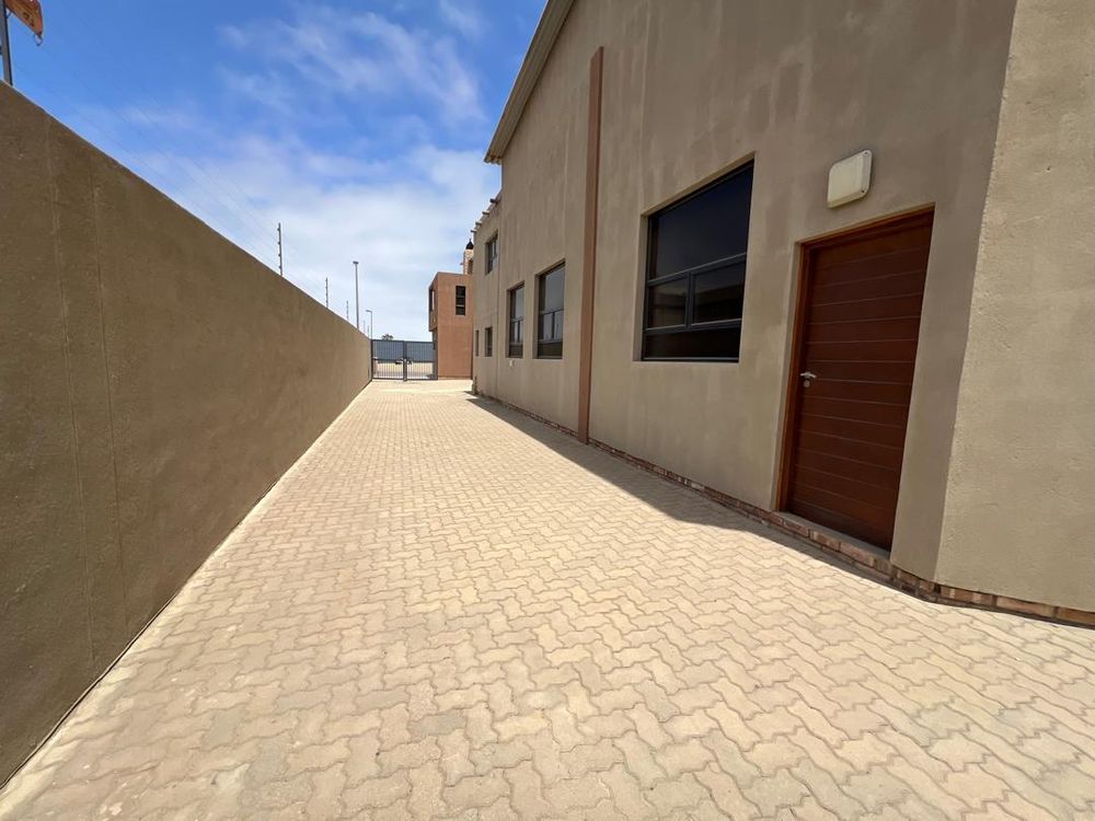 Side entrance 1. Side door opening to showroom/warehouse