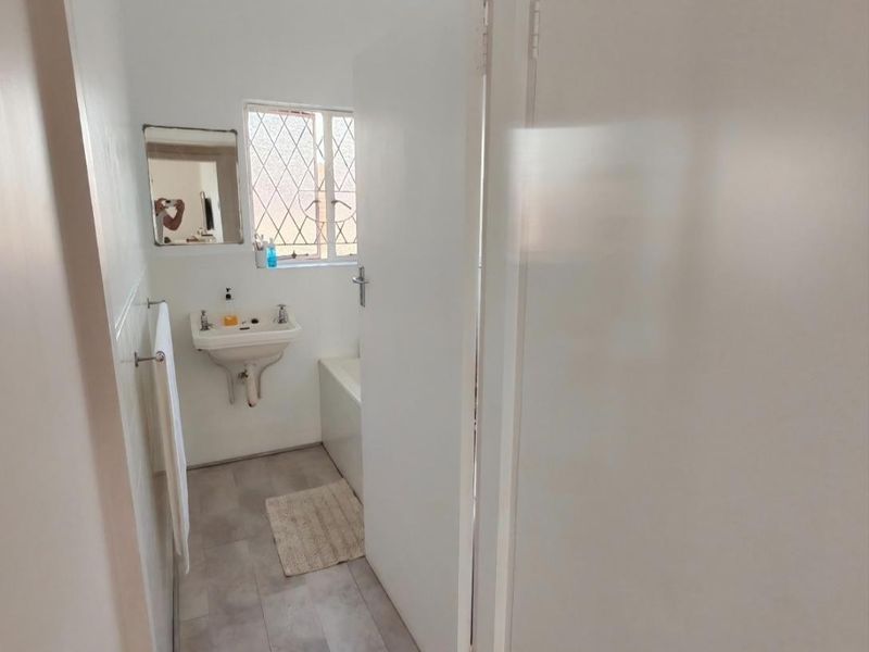 Three-Bedroom Ocean View Starter Home with Inland views nestled in Spacious Garden - Photo 10