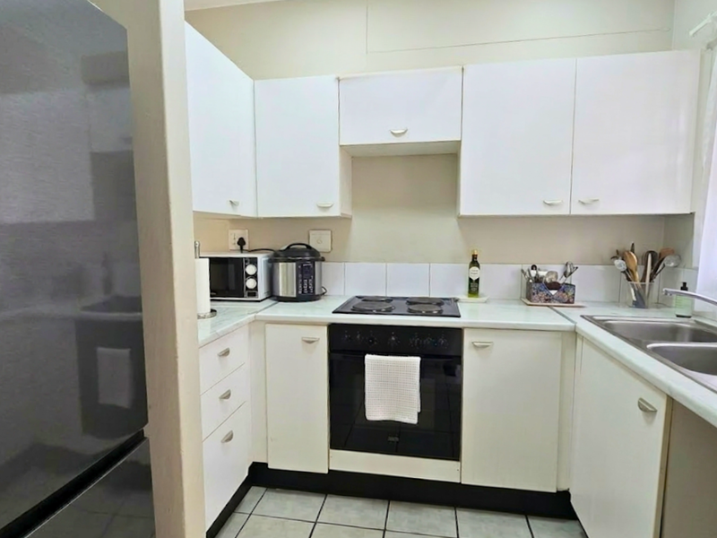 Two-Bedroom Apartment with Private Patio - Photo 6