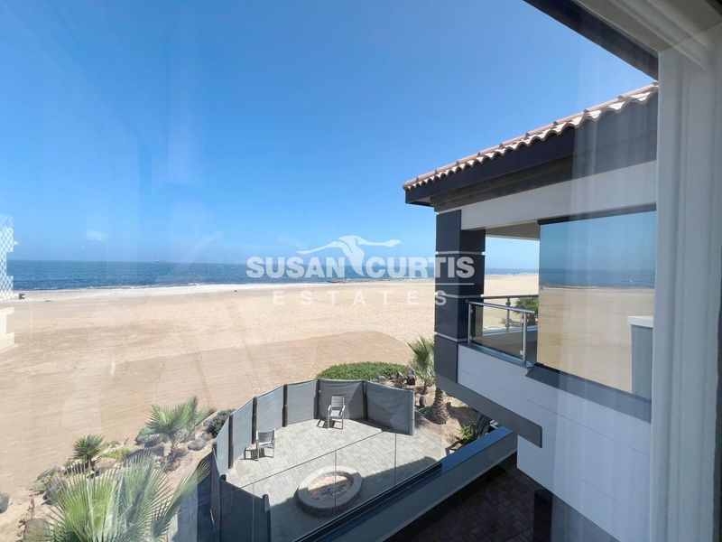 Stunning Modern Beachfront Home – Your Dream Coastal Retreat Awaits! - Photo 6