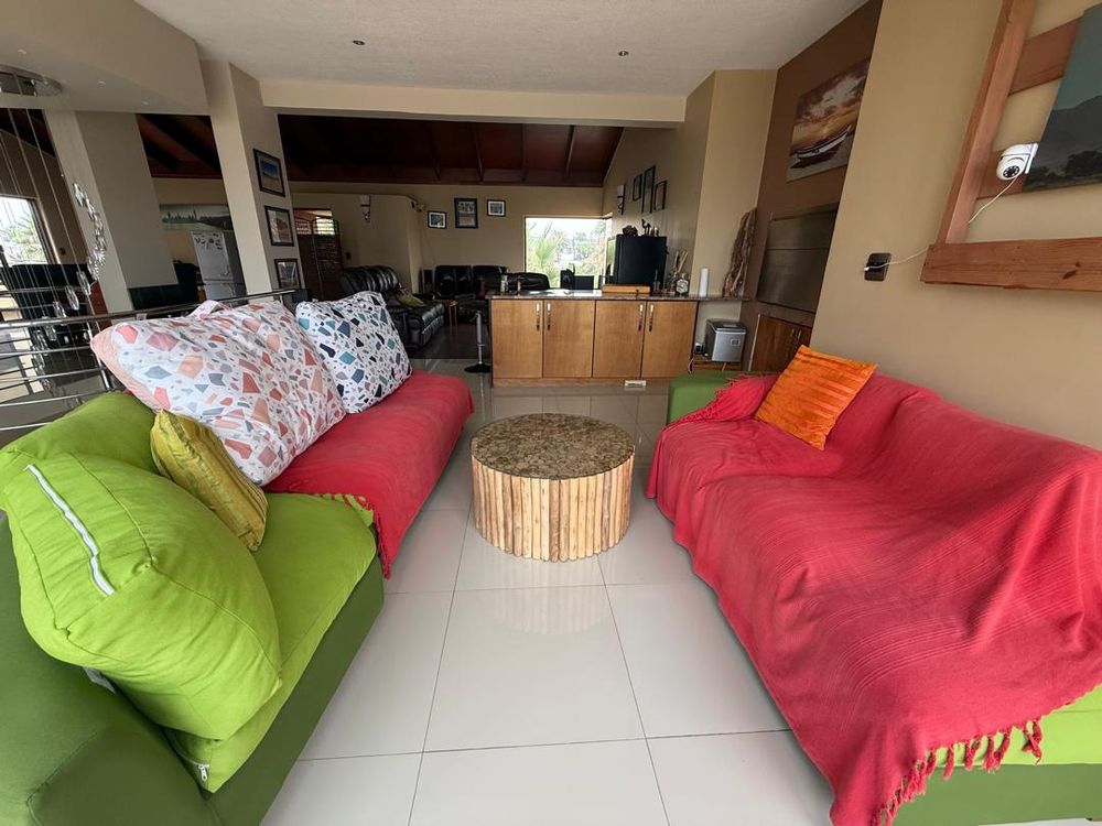 Open plan dining, kitchen and lounges. Indoor BBQ area