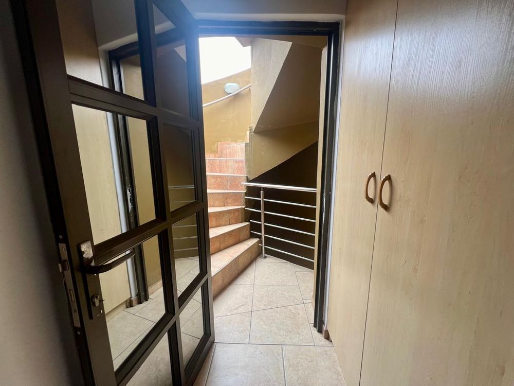 Spiral staircase to the rooftop entertainment area