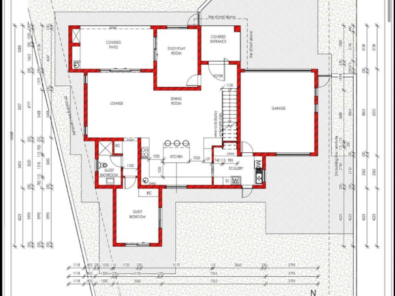 A detailed ground floor architectural plan showing the layout of the living areas, kitchen, scullery, garage, and guest suite.