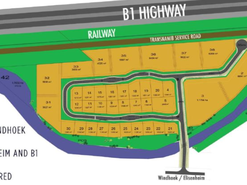 A detailed site layout plan showing multiple commercial land plots, road access, and proximity to the B1 highway and railway infrastructure.