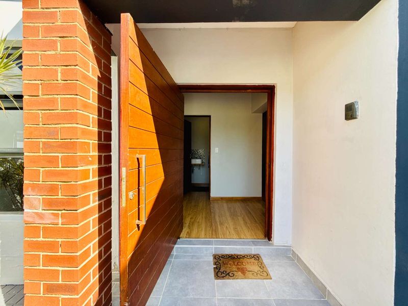 Modern Single-Level Family Home on the Green Belt in Copperleaf Golf Estate - Photo 7