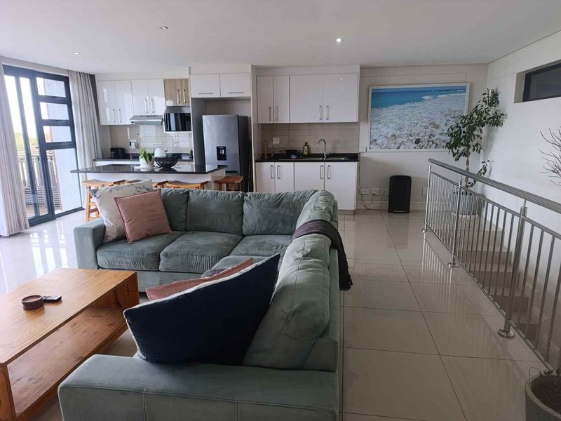 BEACHFRONT BLISS | FULLY FURNISHED 2-BEDROOM APARTMENT FOR RENT - Photo 3