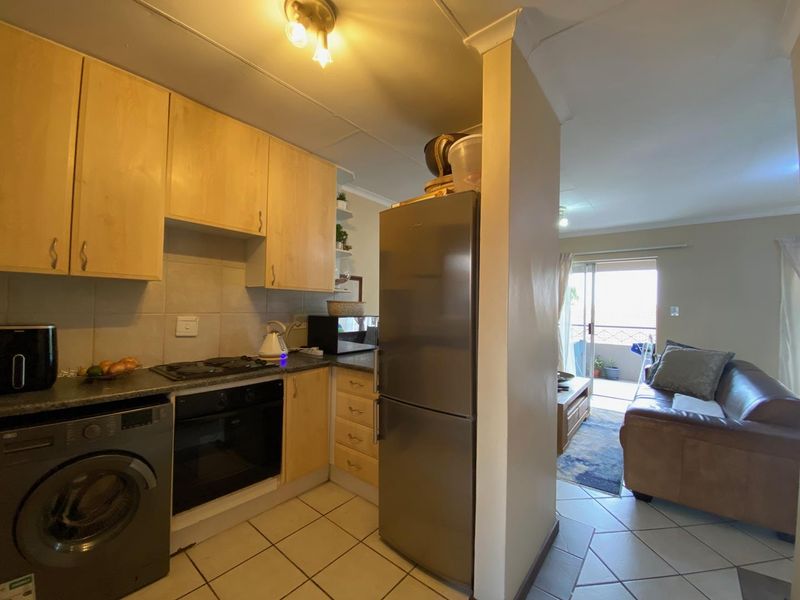 Charming Top-Stack Unit with Stunning Views! - Photo 2