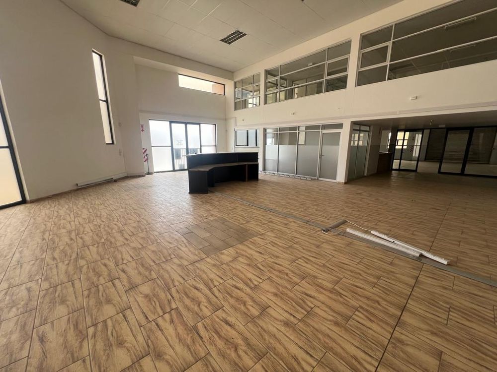 Main entrance reception area, offices and upstairs entertainment area