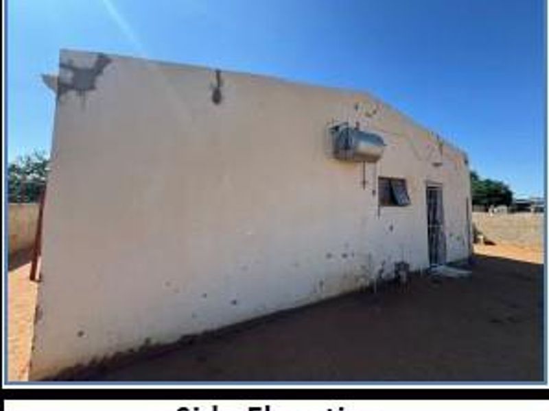 Charming Three-Bedroom Gem Awaits Your Touch - Photo 5