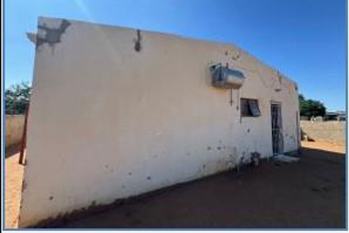 Charming Three-Bedroom Gem Awaits Your Touch - Photo 5