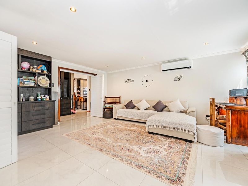 Striking Modern Family Home with Designer Finishes and Effortless Entertaining in Prime Panorama - Photo 3