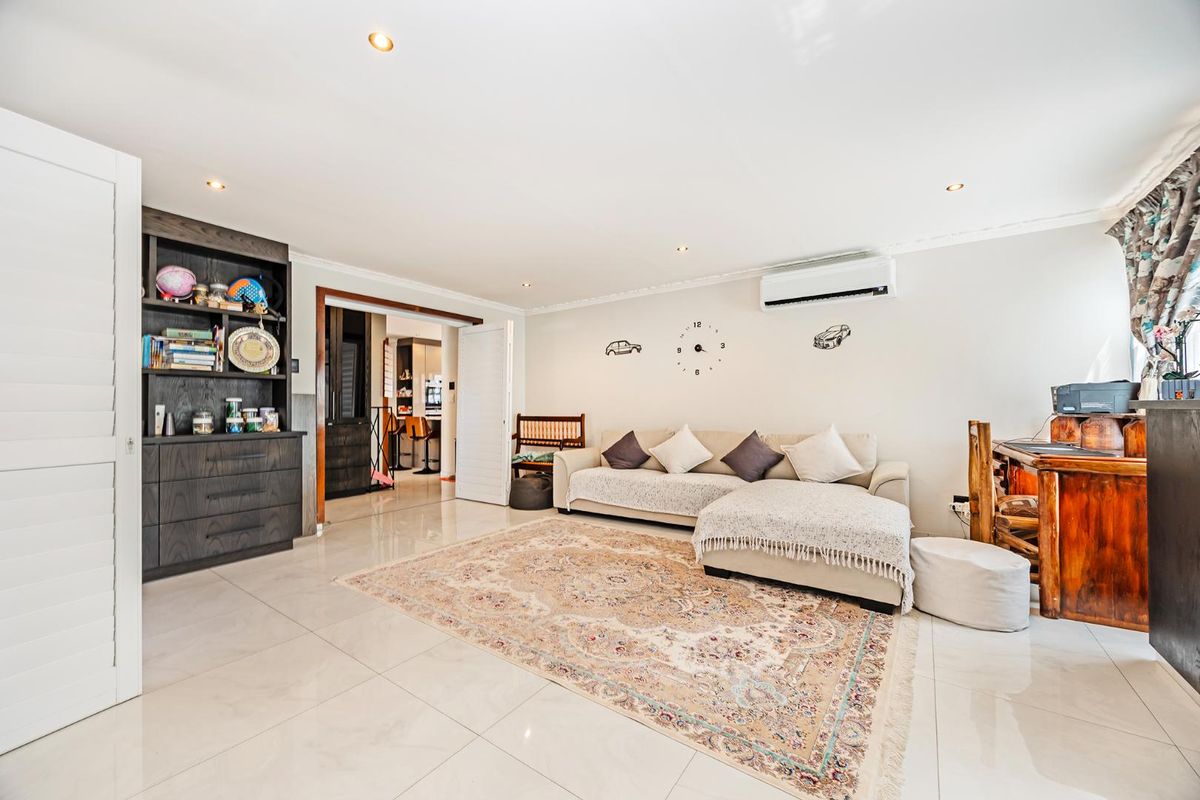 Striking Modern Family Home with Designer Finishes and Effortless Entertaining in Prime Panorama - Photo 3