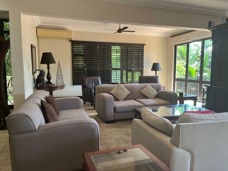 A home offering an exceptional blend of luxury, comfort, & nature, making it the perfect place to call home. - Photo 3
