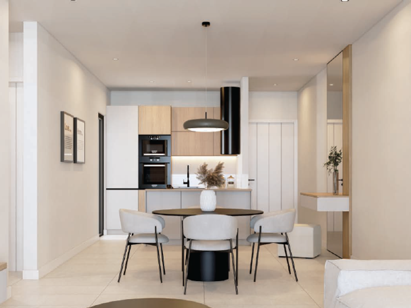 Modern open-plan kitchen and dining area featuring sleek cabinetry, integrated appliances, and neutral tiled flooring in a contemporary penthouse setting.